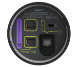 A close-up image of the bottom of the Logitech Sight in graphite. The image shows the connection ports on the device. This includes one Ethernet port for power, one Ethernet port for Rally Bar connection, one Kensington security slot and one Cat6 port for daisychaining additional Rally Mic Pods and Logitech Sight devices.