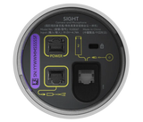 A close-up image of the bottom of the Logitech Sight in white. The image shows the connection ports on the device. This includes one Ethernet port for power, one Ethernet port for Rally Bar connection, one Kensington security slot and one Cat6 port for daisychaining additional Rally Mic Pods and Logitech Sight devices.
