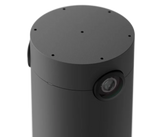 A close-up image of the top of the Logitech Sight in graphite. The image shows the seven beamforming microphones on the top of the device and the dual 4K cameras on the side of the device.