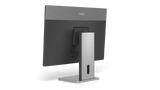 A 45-degree angled photo of the back of the Neat Board 32 on an adaptive table stand. The Neat logo is visible near the top of the back of the device.